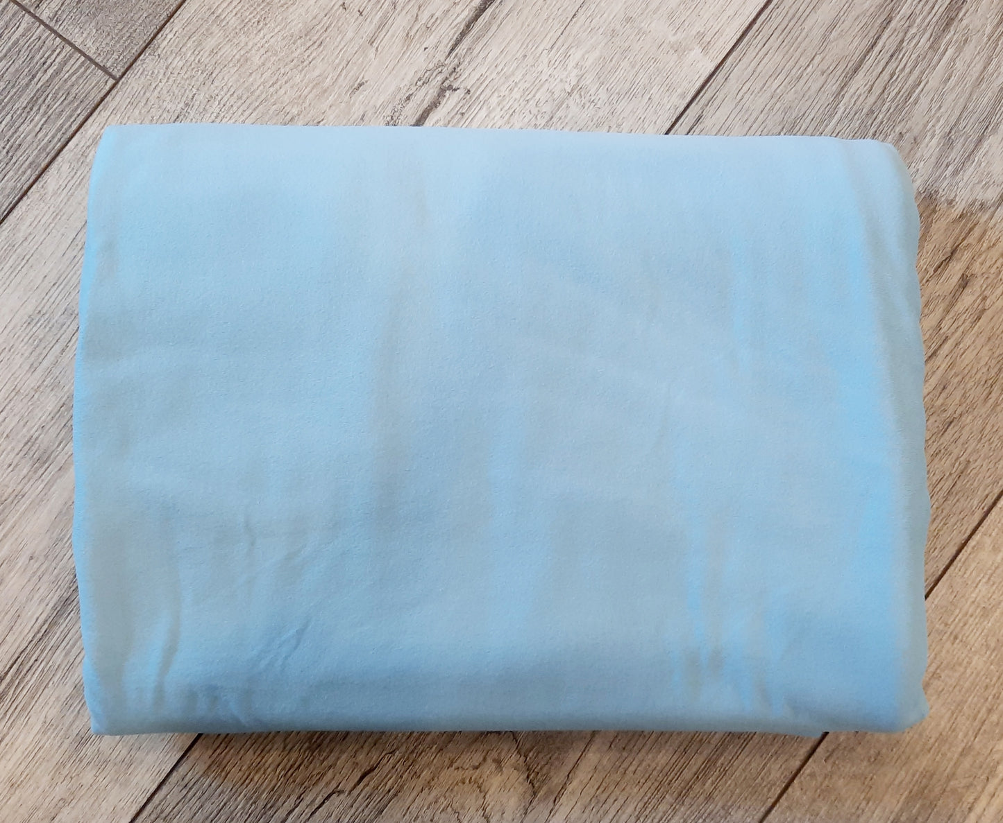 Double brushed poly